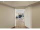 Hallway leading to a living room with a fireplace and city views at 2777 Paradise Rd # 2302, Las Vegas, NV 89109
