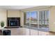 Living room with a fireplace and floor to ceiling windows at 2777 Paradise Rd # 2302, Las Vegas, NV 89109
