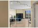 Living room featuring track lighting, fireplace, and balcony with city views at 2777 Paradise Rd # 2302, Las Vegas, NV 89109