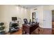 Home office with a large desk, chair, and built-in shelving at 2777 Paradise Rd # 2302, Las Vegas, NV 89109