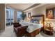 Elegant bedroom featuring a large window with city views, offering a luxurious and serene living space at 2877 Paradise Rd # 2602, Las Vegas, NV 89109