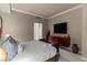 Spacious bedroom with a large TV and refined decor, creating a comfortable and stylish living space at 2877 Paradise Rd # 2602, Las Vegas, NV 89109