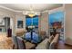 Spacious dining room with a chandelier, seating for eight, and city views from large windows at 2877 Paradise Rd # 2602, Las Vegas, NV 89109