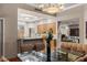 Beautiful dining room with a clear table and an elegant chandelier at 2877 Paradise Rd # 2602, Las Vegas, NV 89109