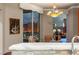 Dining area with large windows offering views of the Las Vegas Strip and custom lighting at 2877 Paradise Rd # 2602, Las Vegas, NV 89109