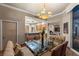 Bright dining space with a large window, chandelier, and a glimpse of the kitchen at 2877 Paradise Rd # 2602, Las Vegas, NV 89109