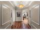 Inviting hallway with hardwood floors, coffered ceilings, and views into the open-concept kitchen and living areas at 2877 Paradise Rd # 2602, Las Vegas, NV 89109