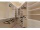 Walk-in closet with custom shelving and storage solutions at 2877 Paradise Rd # 2602, Las Vegas, NV 89109