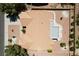 Aerial view of the house showcasing the tile roof, covered patio, and well-manicured landscaping at 2925 Lotus Hill Dr, Las Vegas, NV 89134