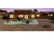 A comfortable patio features ample seating for outdoor dining and relaxation at 2925 Lotus Hill Dr, Las Vegas, NV 89134