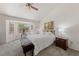 Serene bedroom with a bay window, plush carpeting, and a comfortable king-size bed at 2925 Lotus Hill Dr, Las Vegas, NV 89134