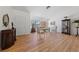 Bright and airy living room featuring hardwood floors, large windows, and elegant furnishings at 2925 Lotus Hill Dr, Las Vegas, NV 89134