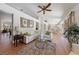 Open-concept living area with hardwood floors, a neutral color palette, and an inviting atmosphere at 2925 Lotus Hill Dr, Las Vegas, NV 89134