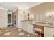 Neutral bathroom with vanity, makeup station, checkerboard tile, and decorative lighting at 3141 E Katie Ave, Las Vegas, NV 89121