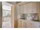 Butler's Pantry featuring white cabinets with a view into the kitchen at 3141 E Katie Ave, Las Vegas, NV 89121
