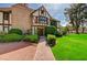 Charming Tudor-style home with brick chimney and lush green lawn at 3141 E Katie Ave, Las Vegas, NV 89121