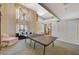 Bright game room with tall ceilings, a ping pong table, and lots of light at 3141 E Katie Ave, Las Vegas, NV 89121