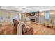 Cozy living room with fireplace, hardwood floors, and built-in cabinets at 3141 E Katie Ave, Las Vegas, NV 89121