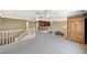 Open loft with staircase, decorative railings, and high ceilings at 3141 E Katie Ave, Las Vegas, NV 89121