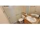 Bathroom featuring a shower with sliding glass doors, a toilet, a sink with mirror, and granite counter at 3151 Soaring Gulls Dr # 2058, Las Vegas, NV 89128