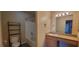 Bathroom featuring a bathtub with shower, vanity with sink, and mirror at 3151 Soaring Gulls Dr # 2058, Las Vegas, NV 89128