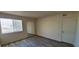 Bedroom with window with blinds and wood-look flooring at 3151 Soaring Gulls Dr # 2058, Las Vegas, NV 89128