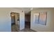 Open living space with modern flooring, neutral paint, and views to the kitchen and other living areas at 3151 Soaring Gulls Dr # 2058, Las Vegas, NV 89128