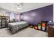Bedroom with ample natural light features carpet floors, and practical storage solutions at 3464 Twilight Star Dr, Las Vegas, NV 89117