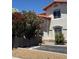 Two-story home featuring desert landscaping, a terracotta roof, and a dedicated parking spot in front at 3464 Twilight Star Dr, Las Vegas, NV 89117