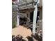 Outdoor patio featuring a white pergola, grill, and concrete pavers, providing a comfortable backyard space at 3464 Twilight Star Dr, Las Vegas, NV 89117