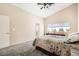 Comfortable bedroom featuring plush carpeting, and ample natural light at 3539 Barrel Bronco Ct, North Las Vegas, NV 89032