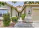 Inviting home entrance with a well-maintained walkway and desert landscaping at 3539 Barrel Bronco Ct, North Las Vegas, NV 89032