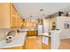 Efficient kitchen featuring laminate countertops and ample storage space at 3539 Barrel Bronco Ct, North Las Vegas, NV 89032