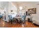 Bright dining area with hardwood floors, neutral walls, and elegant chandelier at 3646 Billman Ave, Las Vegas, NV 89121