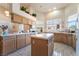 Bright kitchen with tile floors, an island, and plenty of countertop space at 3646 Billman Ave, Las Vegas, NV 89121