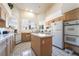 Bright kitchen with tile floors, an island, and plenty of countertop space at 3646 Billman Ave, Las Vegas, NV 89121