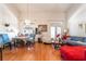 Bright living room featuring hardwood floors, neutral walls, and an open concept design at 3646 Billman Ave, Las Vegas, NV 89121