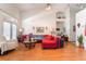 Spacious living room featuring hardwood floors, neutral walls, and plenty of natural light at 3646 Billman Ave, Las Vegas, NV 89121