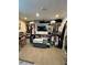Large walk in closet with an organized clothing rack, television, and storage at 3854 Chutney St, Las Vegas, NV 89121