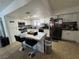 Modern kitchen with marble island, stainless steel appliances, and ample counter space at 3854 Chutney St, Las Vegas, NV 89121