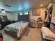 Spacious main bedroom with tile floors, ceiling fan, sitting area, and closet at 3854 Chutney St, Las Vegas, NV 89121
