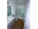 Bathroom featuring a single sink vanity, toilet, and shower-tub combo with a shower curtain at 4363 Spencer St # 8, Las Vegas, NV 89119