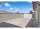 Spacious backyard featuring concrete pavers and block wall fencing at 460 Crestway Rd, Henderson, NV 89015