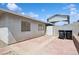 Concrete patio next to backyard with desert landscaping at 460 Crestway Rd, Henderson, NV 89015