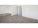 Bright bedroom featuring plush carpeting and a large mirrored closet at 460 Crestway Rd, Henderson, NV 89015