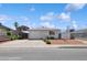Inviting single-story home with desert landscaping, covered parking, and bright curb appeal at 460 Crestway Rd, Henderson, NV 89015