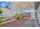 Spacious covered parking area with concrete and desert landscaping for low maintenance at 460 Crestway Rd, Henderson, NV 89015