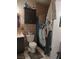 Bathroom featuring patterned tile with dark wood cabinet, and stylized shower curtain at 4727 Conrad St, Las Vegas, NV 89121