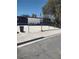 A single story home with a fenced front yard and concrete driveway at 4727 Conrad St, Las Vegas, NV 89121