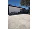 Single story home with covered porch and oversized concrete driveway at 4727 Conrad St, Las Vegas, NV 89121